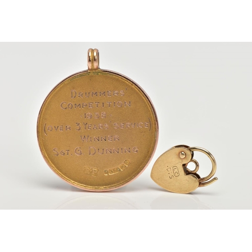 10 - A 9CT GOLD MEDALLION AND YELLOW METAL CHARM, a yellow gold round medallion signed 'Duke of York's Ro... 