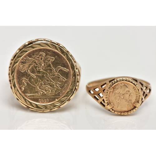 105 - TWO 9CT GOLD COIN RINGS, both with pierced detail to the shoulders, one set with an imitation sovere... 