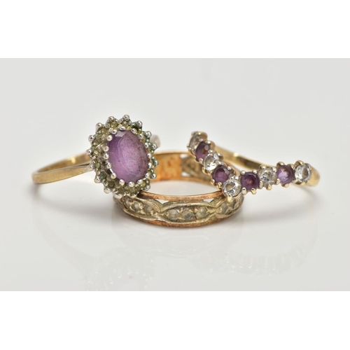 117 - TWO 9CT GOLD GEM SET RINGS AND ONE OTHER, the first a cluster ring centring on an oval cut amethyst ... 