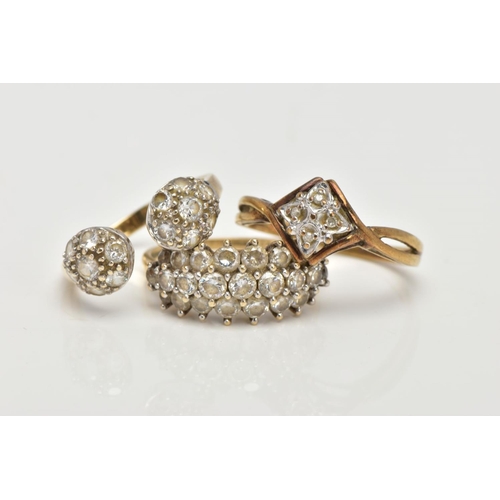 118 - THREE 9CT GOLD RINGS, the first designed with a square panel set with four single cut diamonds, cros... 
