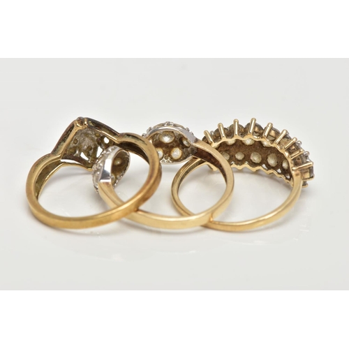 118 - THREE 9CT GOLD RINGS, the first designed with a square panel set with four single cut diamonds, cros... 