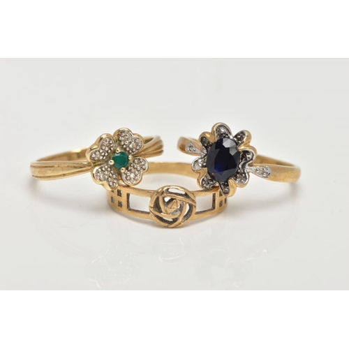 121 - THREE 9CT GOLD RINGS, the first set with an oval cut blue sapphire, within a floral surround set wit... 