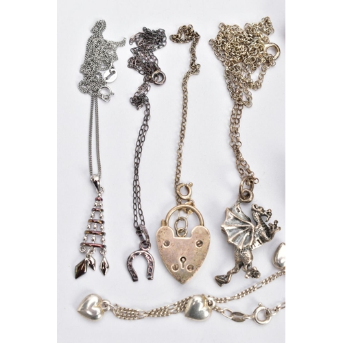 135 - A BAG OF ASSORTED SILVER AND WHITE METAL JEWELLERY, to include a charm bracelet fitted with various ... 