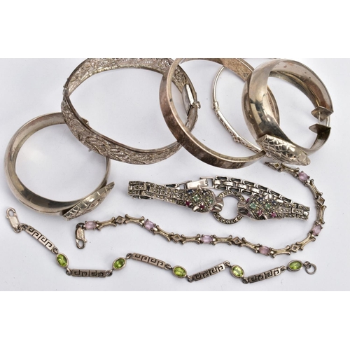 138 - SIX BRACELETS AND A PAIR OF HOOP EARRINGS, to include a silver double jaguar head bracelet set with ... 