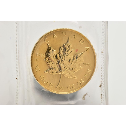 146 - A GOLD CANADIAN 20 DOLLAR COIN, signed 'Canada fine gold half oz or pur coin', detailing a maple lea... 