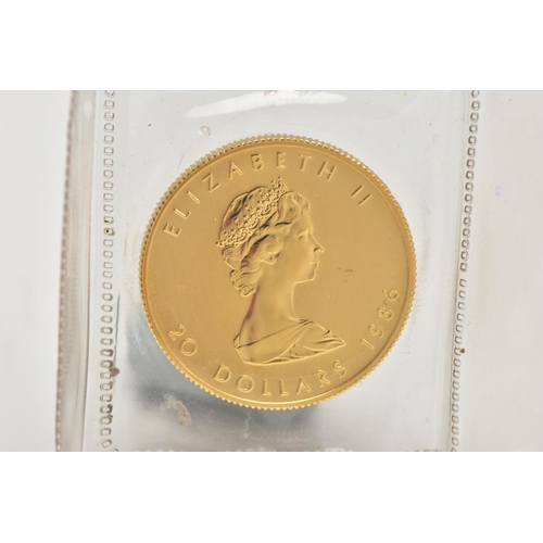 146 - A GOLD CANADIAN 20 DOLLAR COIN, signed 'Canada fine gold half oz or pur coin', detailing a maple lea... 