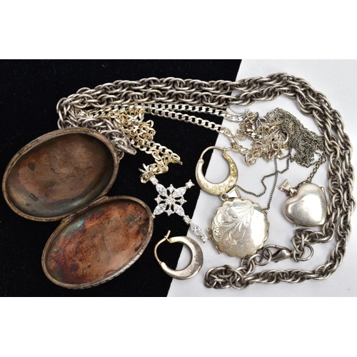 15 - A VICTORIAN SILVER LOCKET WITH OTHER SILVER AND WHITE METAL JEWELLERY, an oval locket engraved with ... 
