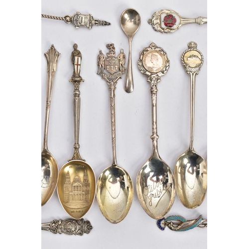 155 - AN ASSORTMENT OF SILVER TEASPOONS, to include a white guilloche enamelled spoon signed on the back '... 