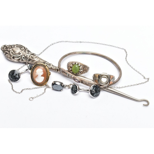 160 - A SILVER HANDLED BUTTON HOOK AND WHITE METAL JEWELLERY,  a scrolled detailed handle hallmarked Chest... 