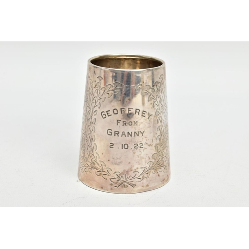 170 - A SILVER CHRISTENING CUP, tapered form, engraved with a floral and foliate design, personal engravin... 