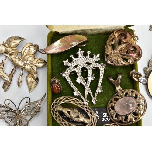 173 - AN ASSORTMENT OF SILVER AND WHITE METAL JEWELLERY, to include a floral brooch hallmarked sterling Sh... 