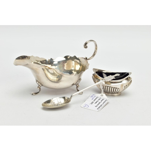 179 - A SILVER SAUCE BOAT, SALT AND TEASPOON, the sauce boat with a wavy rim, fitted with a scrolling hand... 