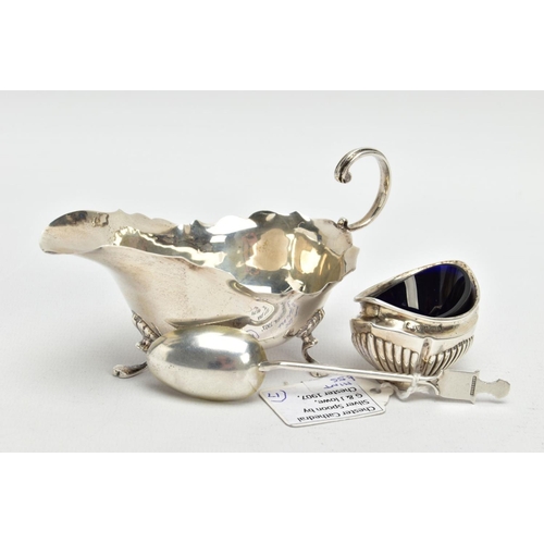 179 - A SILVER SAUCE BOAT, SALT AND TEASPOON, the sauce boat with a wavy rim, fitted with a scrolling hand... 