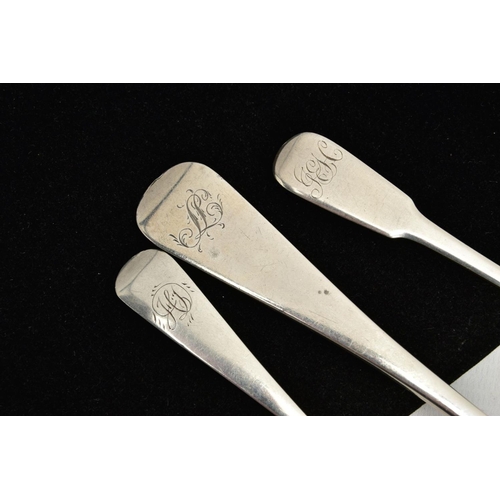 180 - THREE SILVER SPOONS, to include an old English pattern serving spoon, engraved initials to the termi... 