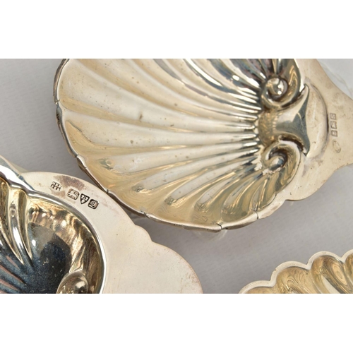 181 - FIVE SILVER SHELL DISHES, each raised on three ball feet, with full silver hallmarks for Chester, Bi... 