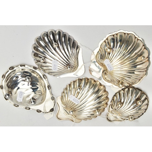 181 - FIVE SILVER SHELL DISHES, each raised on three ball feet, with full silver hallmarks for Chester, Bi... 