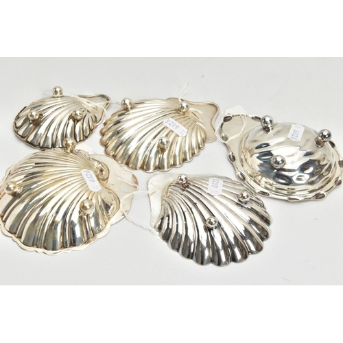 181 - FIVE SILVER SHELL DISHES, each raised on three ball feet, with full silver hallmarks for Chester, Bi... 