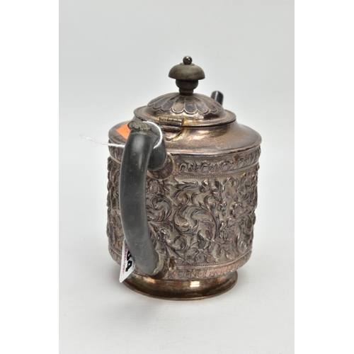 184 - A LATE VICTORIAN SILVER TEAPOT, embossed floral and foliate design, fitted with an ebonised wooden h... 