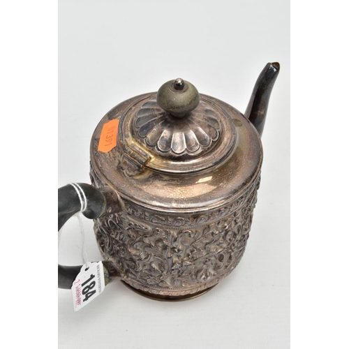 184 - A LATE VICTORIAN SILVER TEAPOT, embossed floral and foliate design, fitted with an ebonised wooden h... 