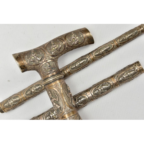 185 - AN ASIAN WHITE METAL WALKING CANE, embossed religious figures throughout, can be taken apart into th... 