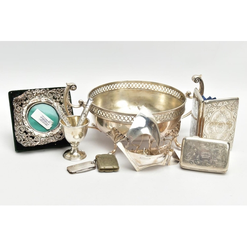 193 - AN ASSORTMENT OF SILVER AND WHITE METAL ITEMS, to include a silver purse, engraved with a floral and... 