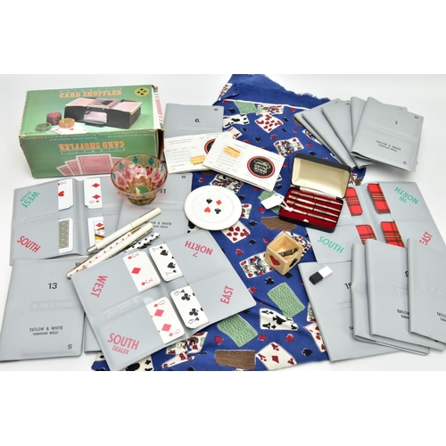 214 - A BRIDGE PLAYING CARDS SET,  to include  a boxed set of four cards theamed pencils stamped sterling ... 