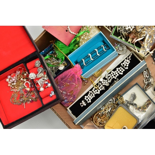 216 - A BOX OF ASSORTED COSTUME JEWELLERY, to include a signed Pandora bracelet and a selection of white m... 