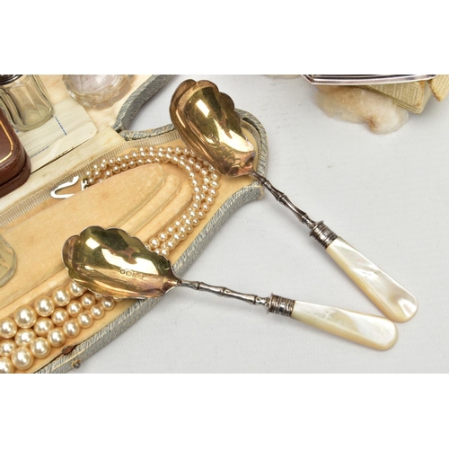 225 - A BOX OF ASSORTED ITEMS,  to include two silver scalloped spoons with mother of pearl handles, hallm... 