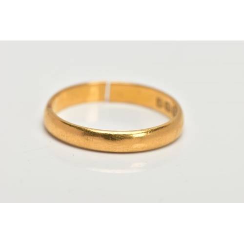 23 - AN AF 22CT GOLD BAND RING, polished court ring, approximate dimensions width 3mm x depth 1mm, hallma... 