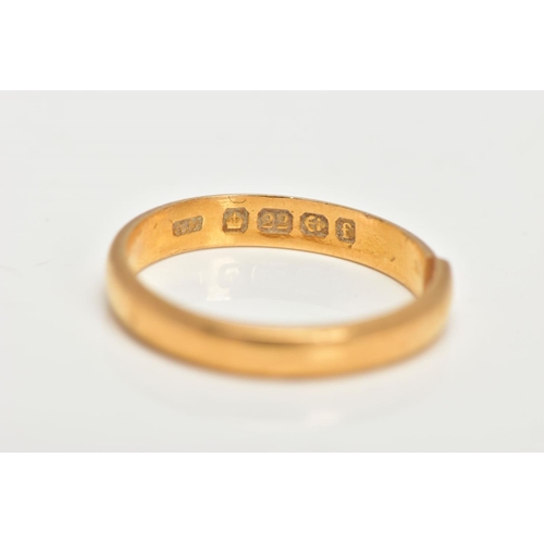 23 - AN AF 22CT GOLD BAND RING, polished court ring, approximate dimensions width 3mm x depth 1mm, hallma... 