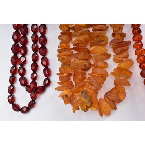 31 - AN ASSORTMENT OF AMBER, COPAL AND BEADED JEWELLERY, to include an unpolished assorted size amber nec... 