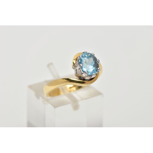 36 - AN 18CT GOLD AQUAMARINE RING, an oval cut aquamarine, approximate dimensions length 8mm x width 6mm,... 
