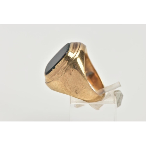 4 - A 9CT BLOODSTONE SIGNET RING, a rectangular bloodstone inlayed into an oval yellow gold collet mount... 