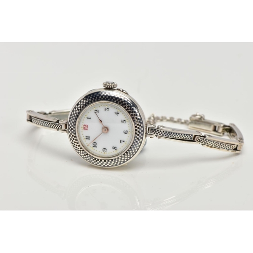 41 - A LADY'S SILVER WRISTWATCH, hand wound movement, round white dial, Arabic numberals, gold coloured h... 