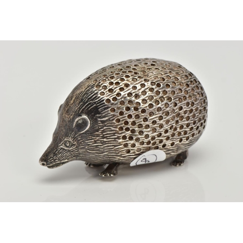 49 - AN EARLY 20TH CENTURY SILVER PIN CUSHION, of a realistically textured hedgehog, openwork pin cushion... 