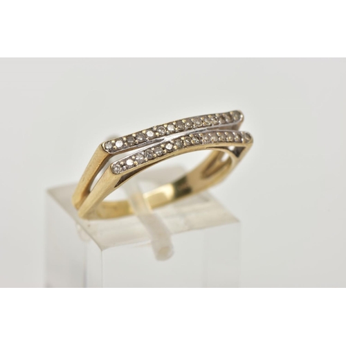 54 - A 9CT GOLD DIAMOND RING, designed with two slightly curved rows of channel set single cut diamonds, ... 