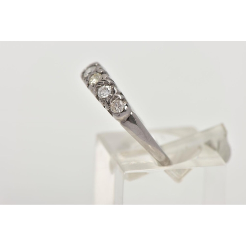 55 - AN 18CT WHITE GOLD DIAMOND RING, designed with a row of seven round brilliant cut diamonds, estimate... 