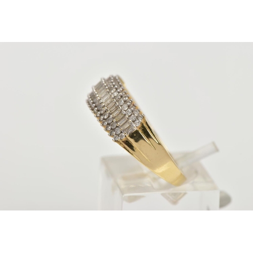 65 - AN 18CT GOLD DIAMOND DRESS RING, set with a central row of rectangular cut diamonds, within double r... 