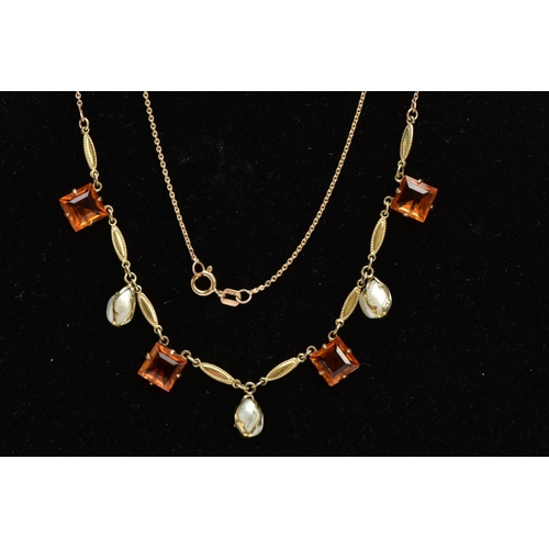 67 - A 9CT GOLD TOPAZ AND PEARL NECKLACE, fine cable chain fitted with oval textured links interspaced wi... 