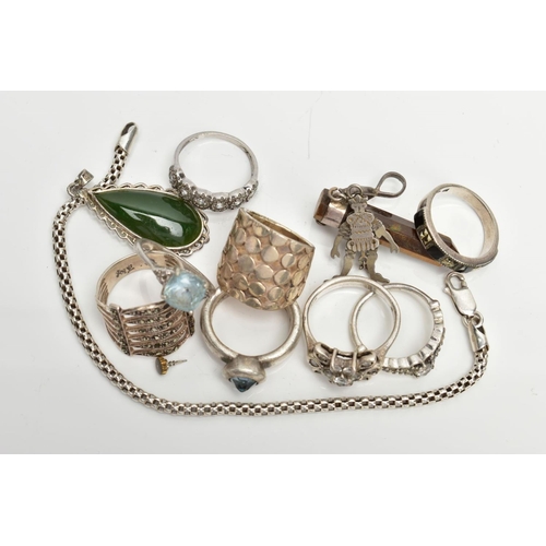 84 - A BAG OF WHITE METAL RINGS, PENDANTS AND A BRACELET, eight white metal rings of various designs all ... 