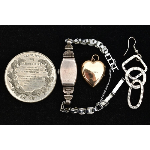 88 - A COMMEMORATIVE COIN, LOCKET, WATCH AND EARRING, to include a 1916 battle of Jutland, German fleet s... 