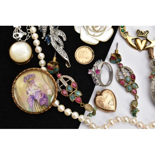 92 - A BAG OF ASSORTED ITEMS, to include a large metal pendant set with rubies, quartz and colourless sto... 