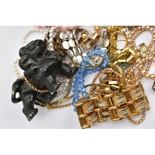 98 - A BAG OF ASSORTED COSTUME JEWELLERY, to include white metal damascene hinged bangle unmarked, a carv... 