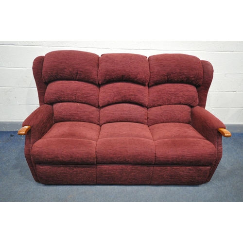 1633 - A RED UPHOLSTERED THREE SEATER SETTEE, length 177cm