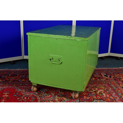 1334A - A GREEN OVERPAINTED PINE TOOL CHEST, cast iron handles to  the sides, lacking interior fittings and ... 
