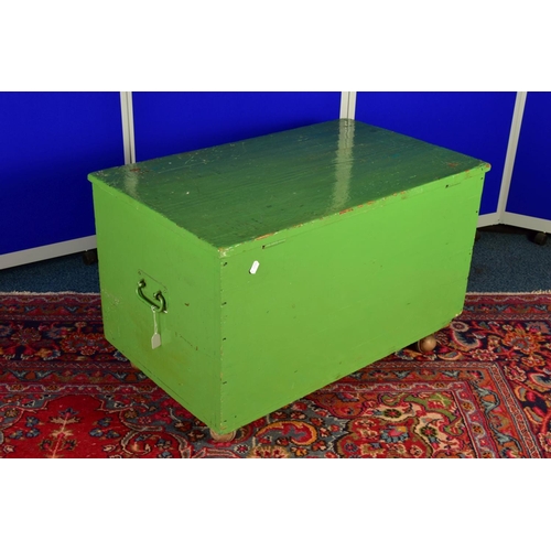 1334A - A GREEN OVERPAINTED PINE TOOL CHEST, cast iron handles to  the sides, lacking interior fittings and ... 