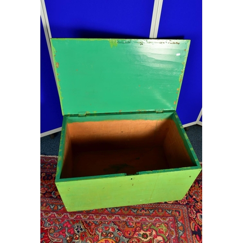 1334A - A GREEN OVERPAINTED PINE TOOL CHEST, cast iron handles to  the sides, lacking interior fittings and ... 