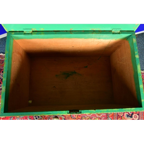 1334A - A GREEN OVERPAINTED PINE TOOL CHEST, cast iron handles to  the sides, lacking interior fittings and ... 