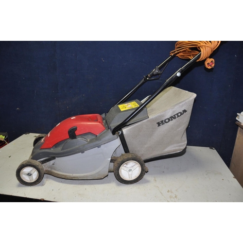 1300 - A HONDA HRE 370 LAWNMOWER electric lawn mower with grass box and a Qualcast Panther 30 push along la... 