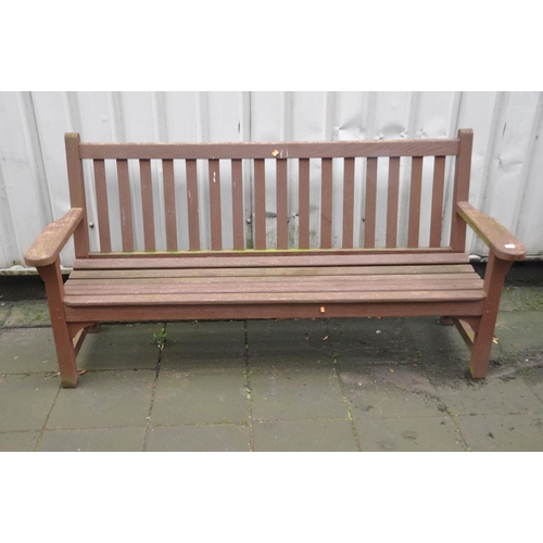 1212 - A HARDWOOD GARDEN BENCH with slatted seat and back, width 193cm